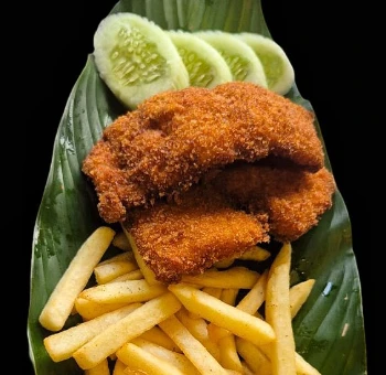 Crispy fish cutlet fries in banana leaf